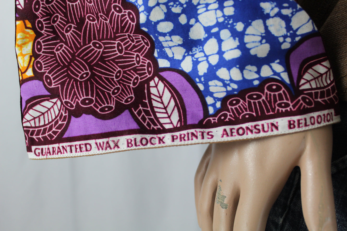 Upcycled jean jacket 12W Leather Applique Agyinduwura symbol & Ankara brown denim One-Of-A-Kind African Diaspora