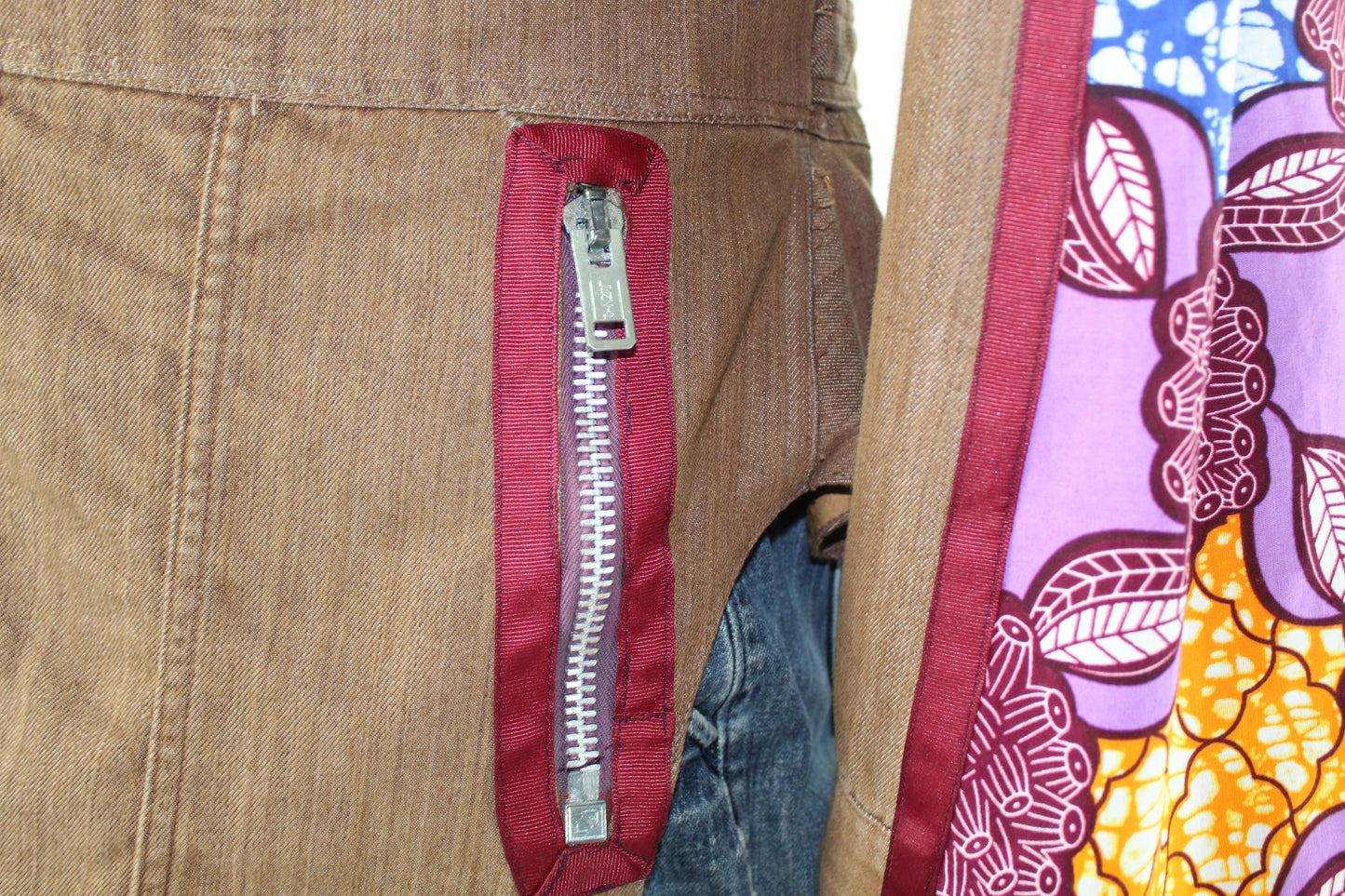 Upcycled jean jacket 12W Leather Applique Agyinduwura symbol & Ankara brown denim One-Of-A-Kind African Diaspora