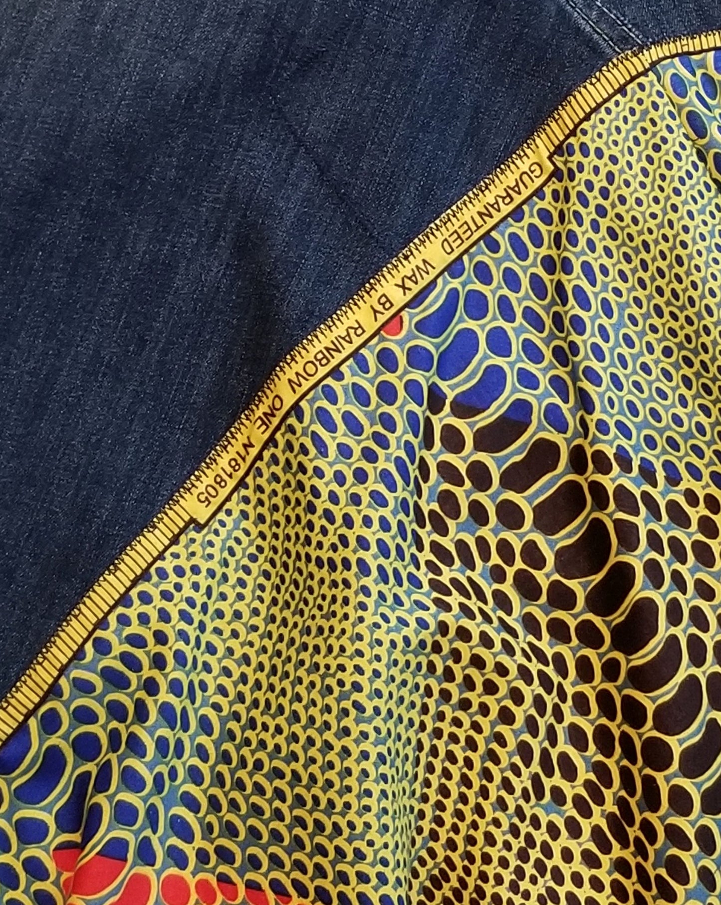 Upcycled Gap jeans 18 Plus to jean skirt Leather Ankh applique & Ankara Hi-Lo hem One-Of-A-Kind African Diaspora
