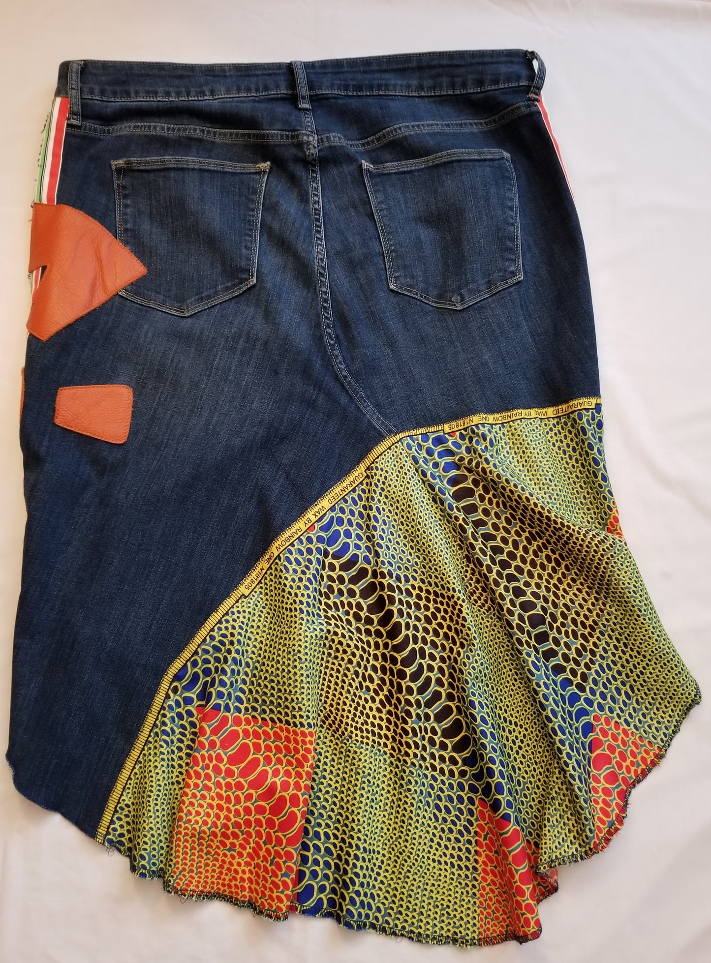 Upcycled Gap jeans 18 Plus to jean skirt Leather Ankh applique & Ankara Hi-Lo hem One-Of-A-Kind African Diaspora