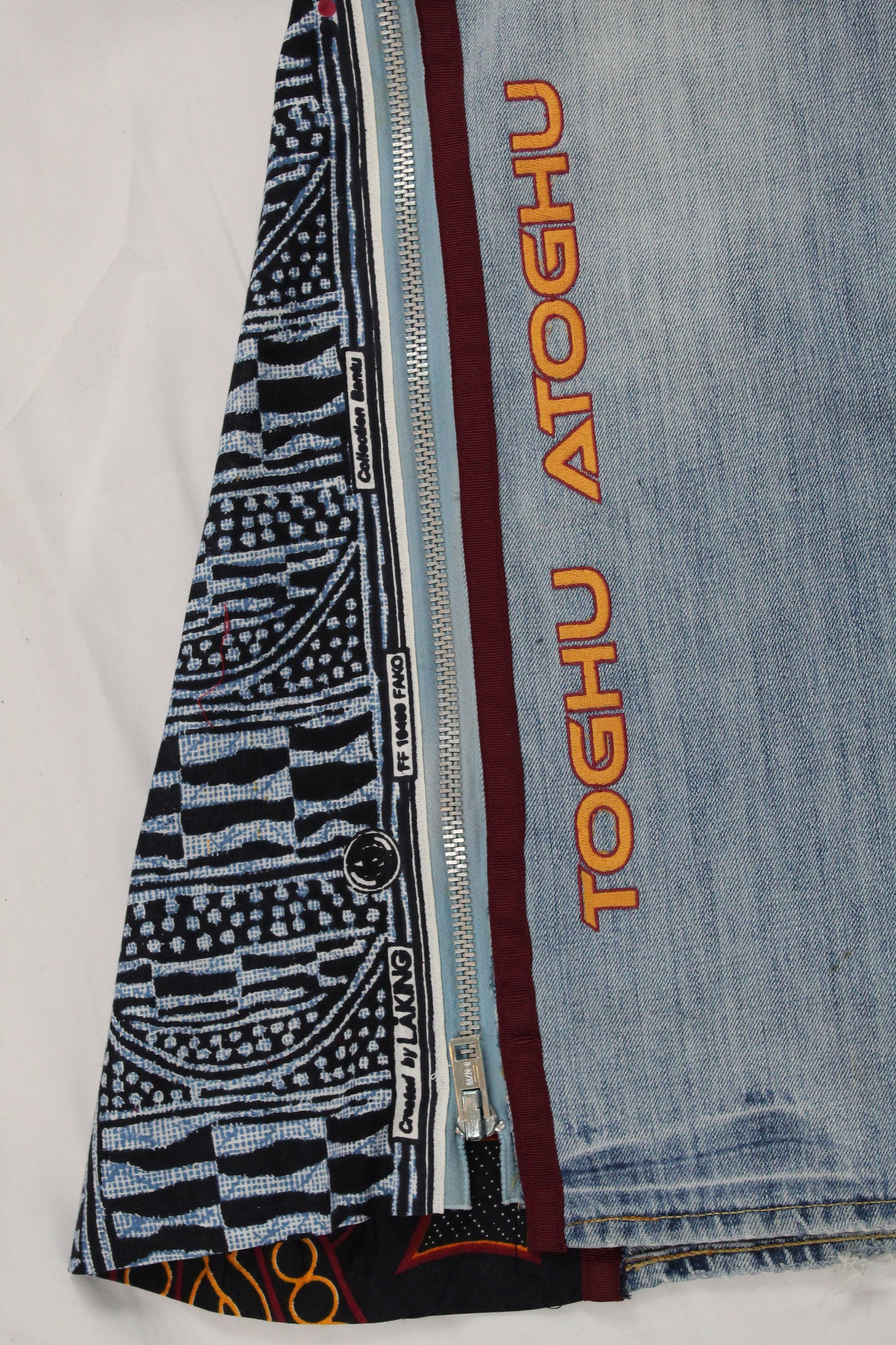 Upcycled American Eagle jeans 38 / 16 Plus Unisex embroidered Cameroon Atoghu Togh & Ankara One-Of-A-Kind African Diaspora
