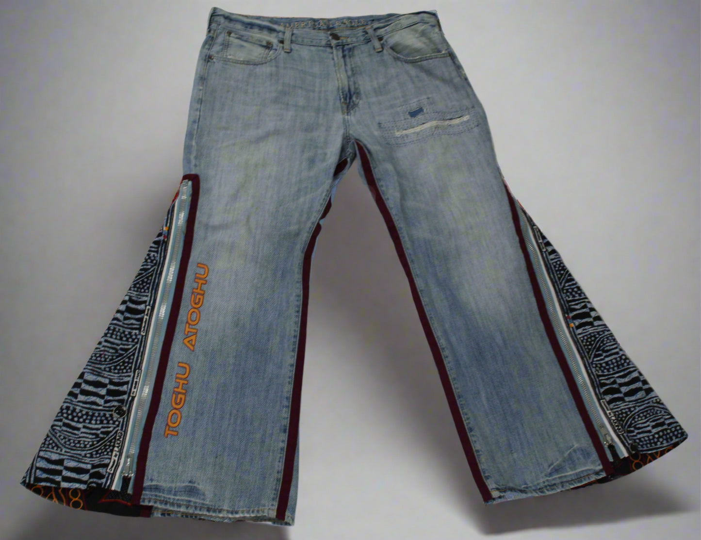Upcycled American Eagle jeans 38 / 16 Plus Unisex embroidered Cameroon Atoghu Togh & Ankara One-Of-A-Kind African Diaspora