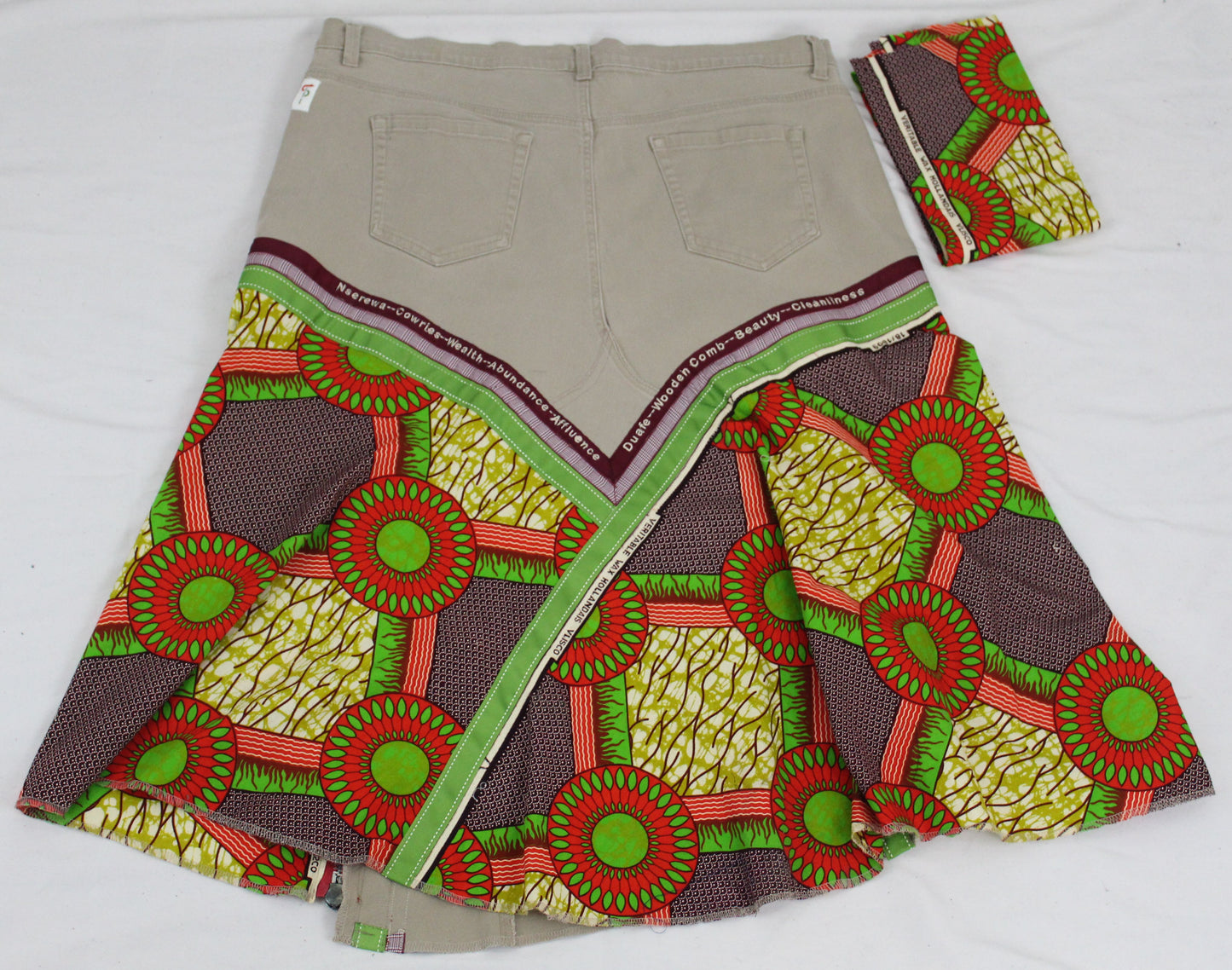 Upcycled jean skirt 20W Plus Nserewa Duafe Leather Applique & Ankara Khaki denim One-Of-A-Kind