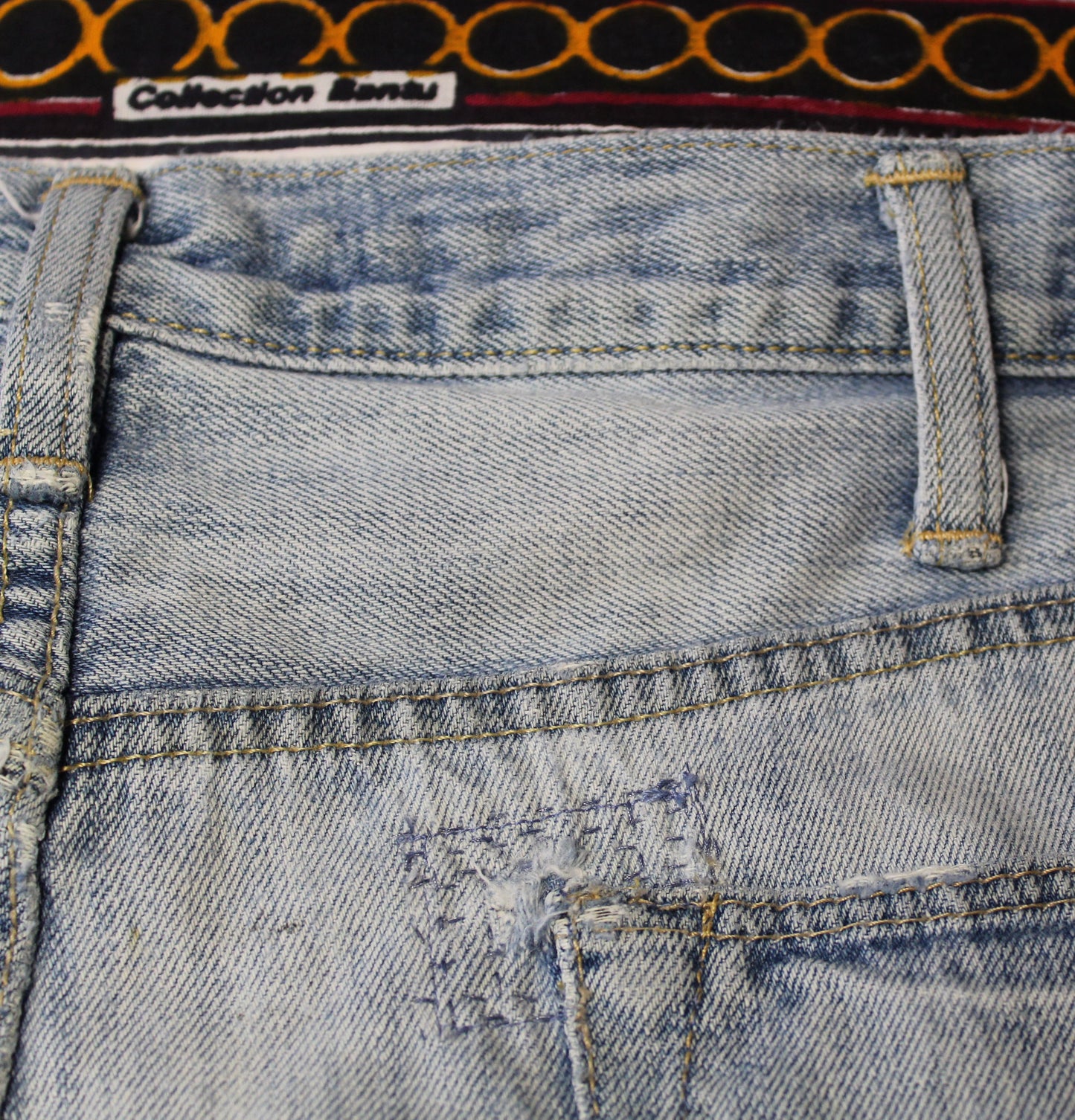Upcycled American Eagle jeans 38 / 16 Plus Unisex embroidered Cameroon Atoghu Togh & Ankara One-Of-A-Kind African Diaspora