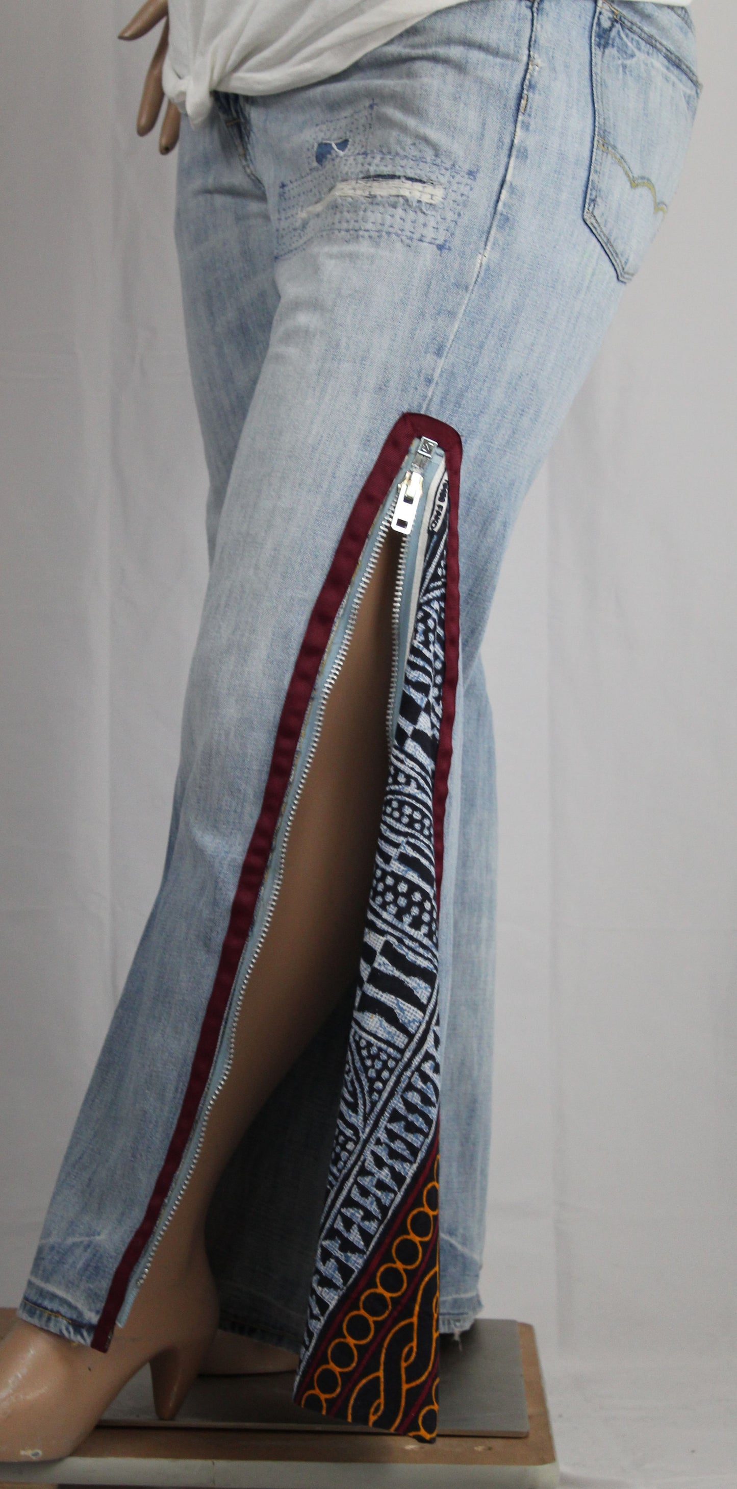 Upcycled American Eagle jeans 38 / 16 Plus Unisex embroidered Cameroon Atoghu Togh & Ankara One-Of-A-Kind African Diaspora