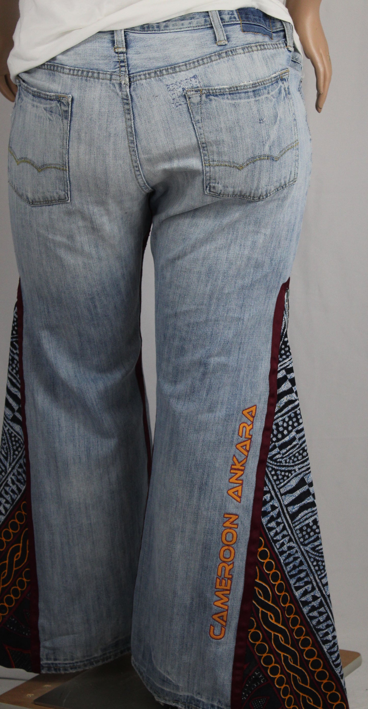 Upcycled American Eagle jeans 38 / 16 Plus Unisex embroidered Cameroon Atoghu Togh & Ankara One-Of-A-Kind African Diaspora