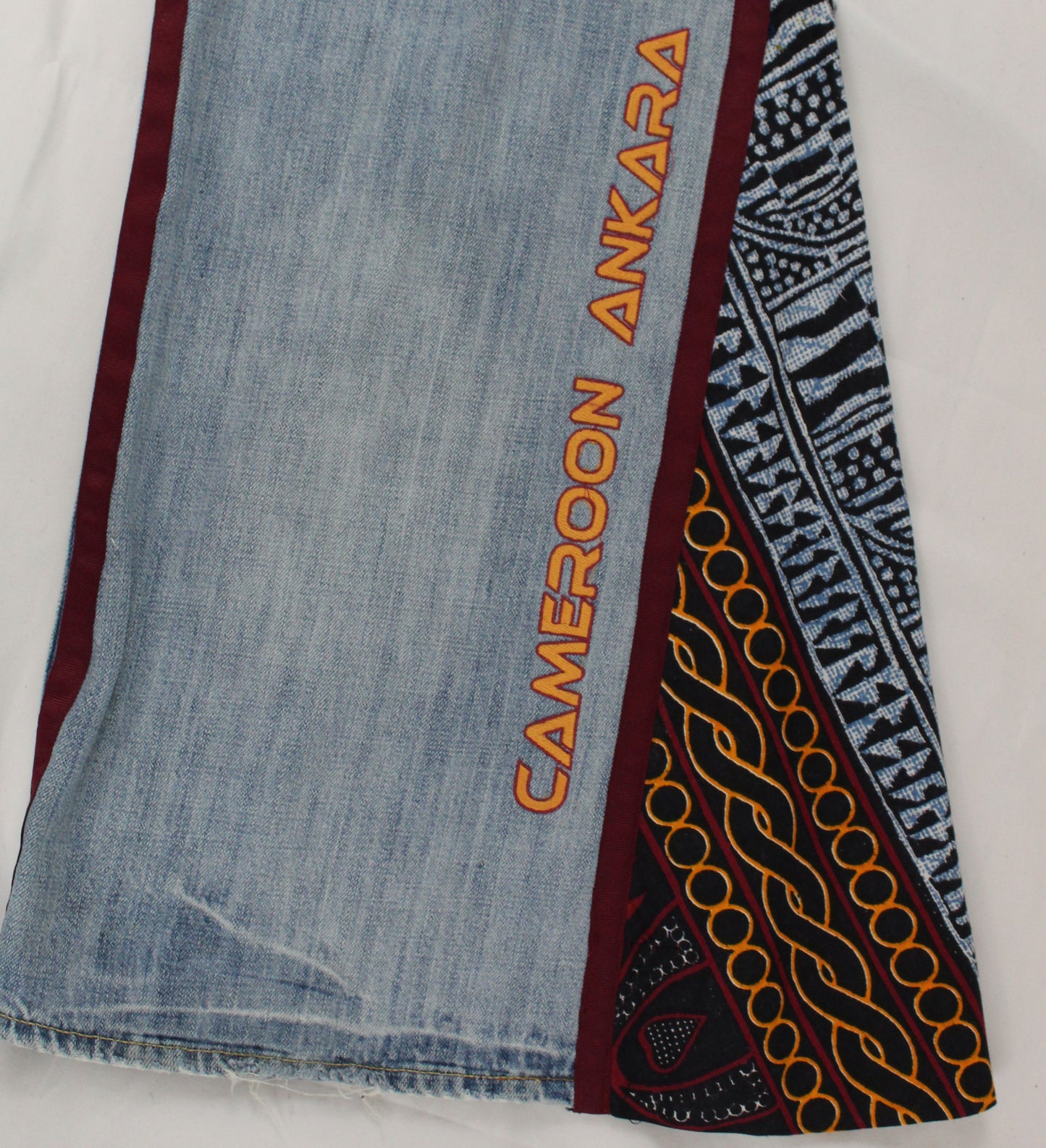 Upcycled American Eagle jeans 38 / 16 Plus Unisex embroidered Cameroon Atoghu Togh & Ankara One-Of-A-Kind African Diaspora
